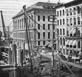 Finishing the Roof of the Chamber of Commerce; Glass Lantern Slide, ca. 1872 (ichi-02860a)